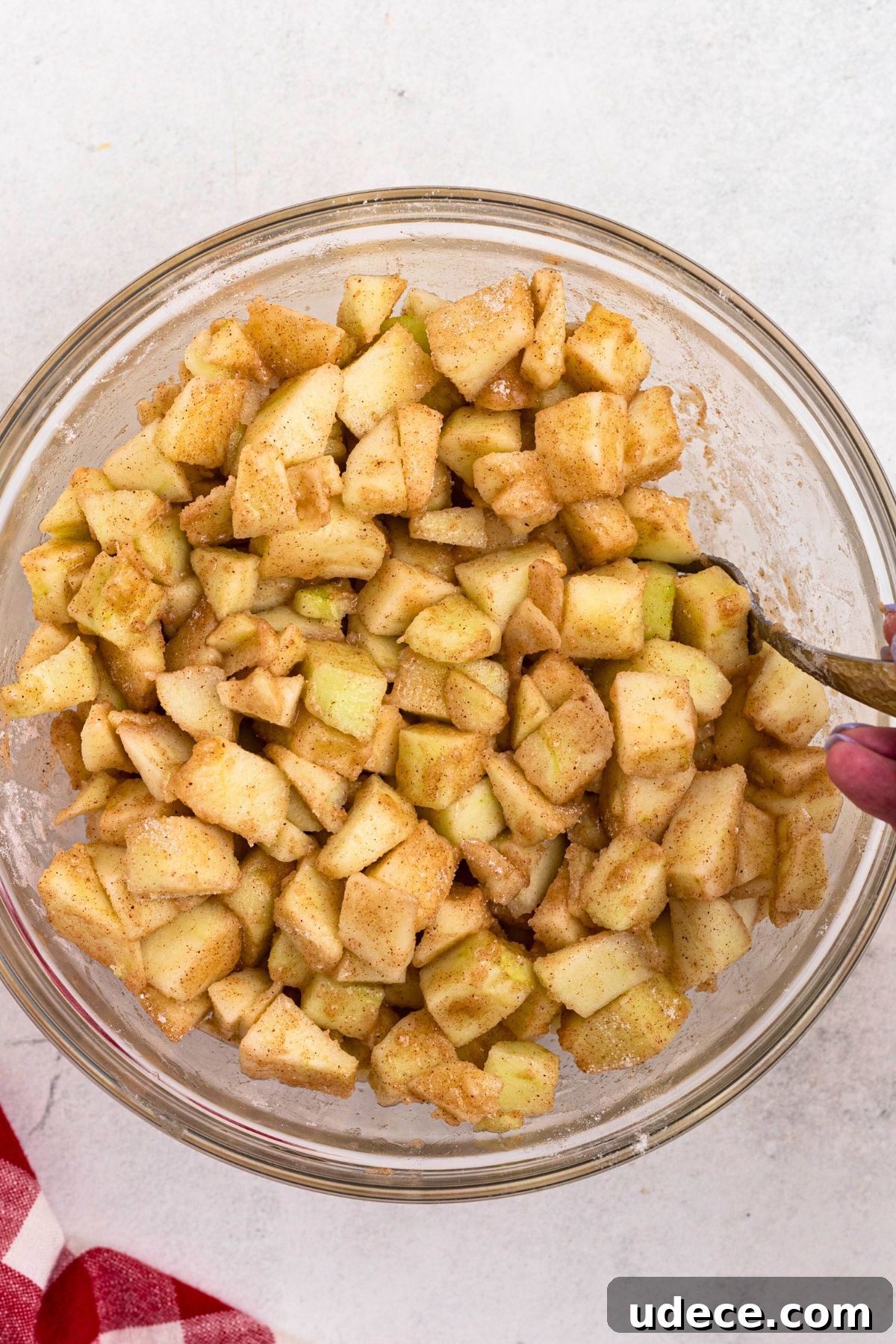 Classic Homemade Apple Pie Recipe for Perfect Crust and Filling 5 Sliced of apples tossed with flour, sugar, and spices.