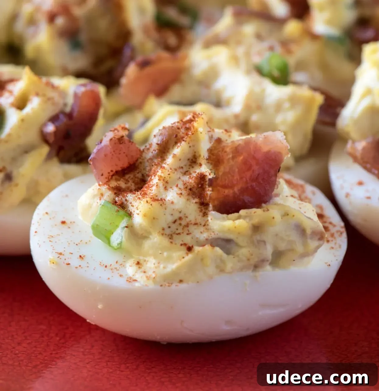 Smoky Bacon Deviled Eggs Recipe with Crispy Bacon Crumble 5 Deviled eggs on a plate