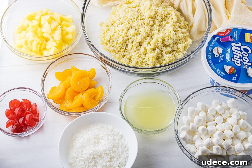 Refreshing Frog Eye Salad Recipe with Pineapple & Whipped Cream 3 bowls filled with cherries, pineapple, mandarin oranges, pineapple juice, acini de pepe pasta and mini marshmallows