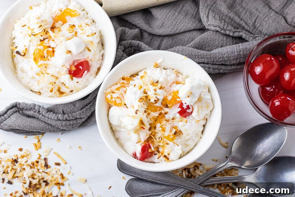 Refreshing Frog Eye Salad Recipe with Pineapple & Whipped Cream 4 small bowl of fruit salad topped with toasted coconut