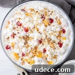 Refreshing Frog Eye Salad Recipe with Pineapple & Whipped Cream 6 fruit salad with cherries, oranges and pineapples, small pasta and whipped topping