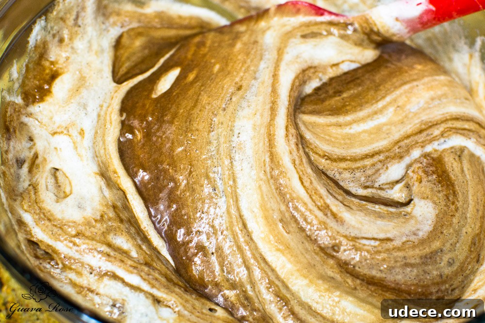 Folding egg whites into chocolate batter 4