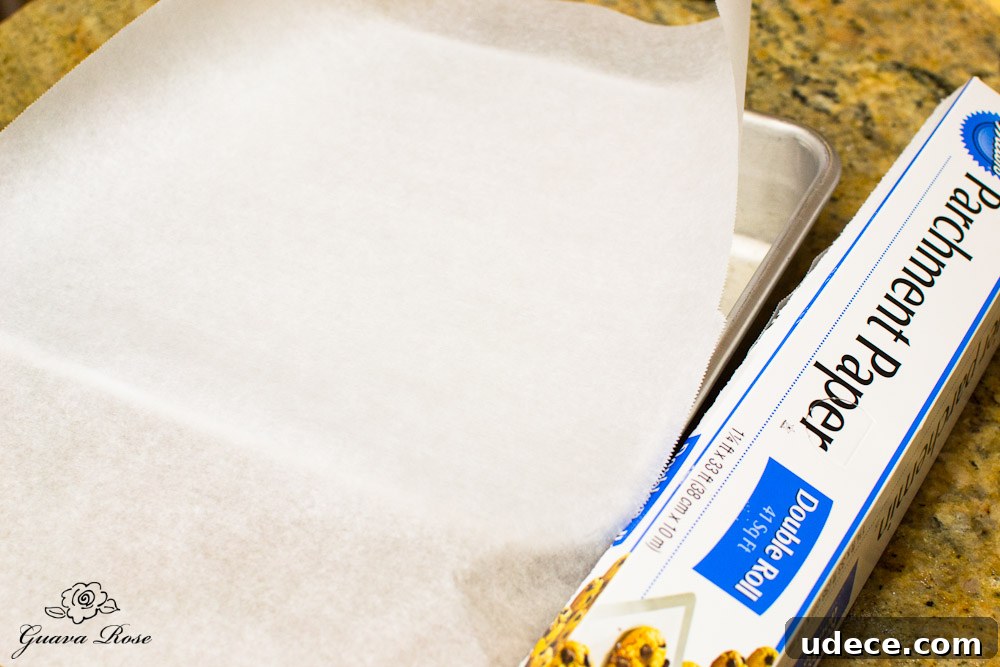 Tearing parchment paper to line baking pan