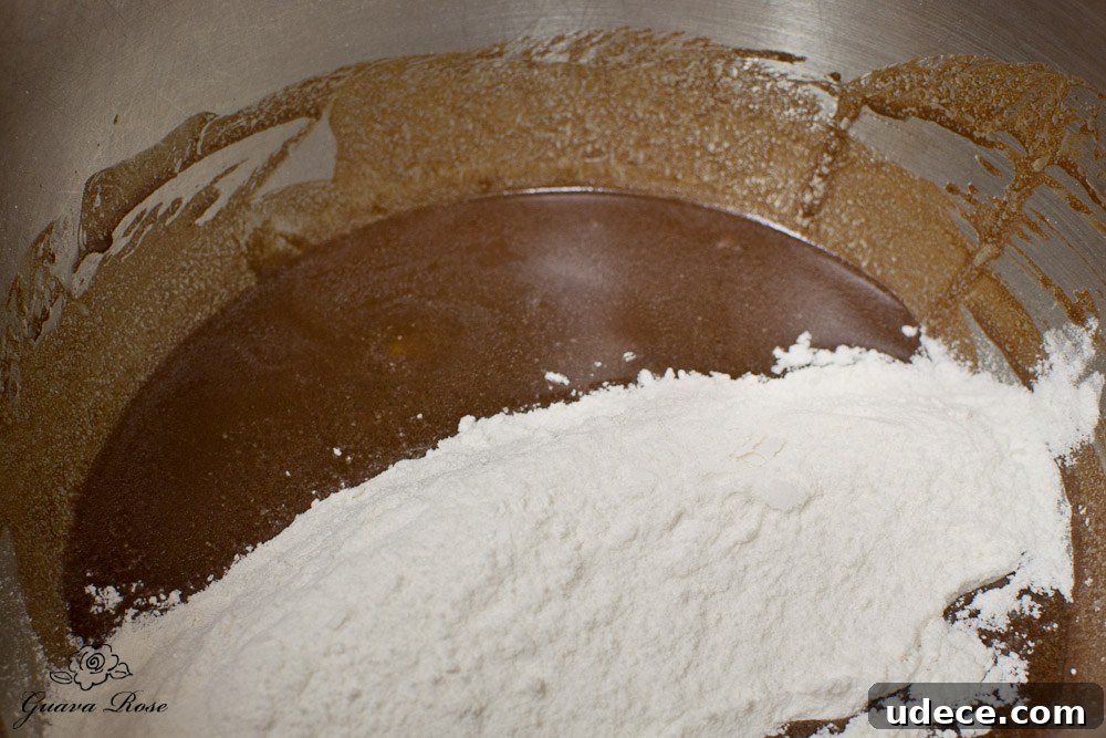 Adding dry ingredients to chocolate mixture