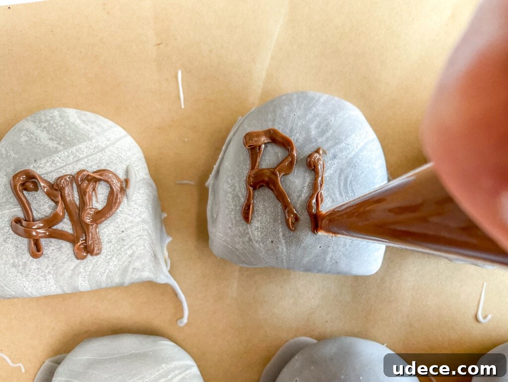 Graveyard Brownies: Spooky Halloween Dessert Recipe 11 Pipe RIP with Nutella onto the cookie graves