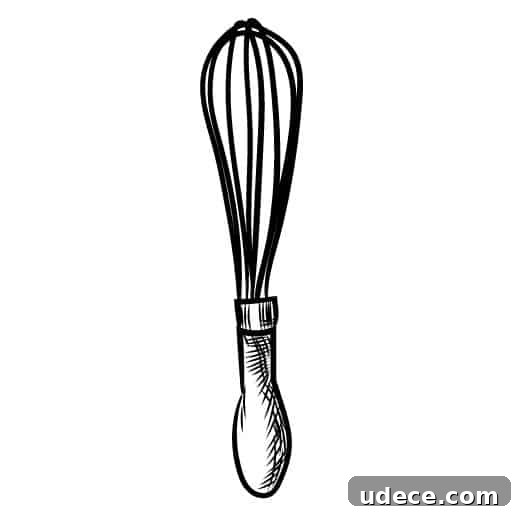 Graveyard Brownies: Spooky Halloween Dessert Recipe 17 Image of a whisk