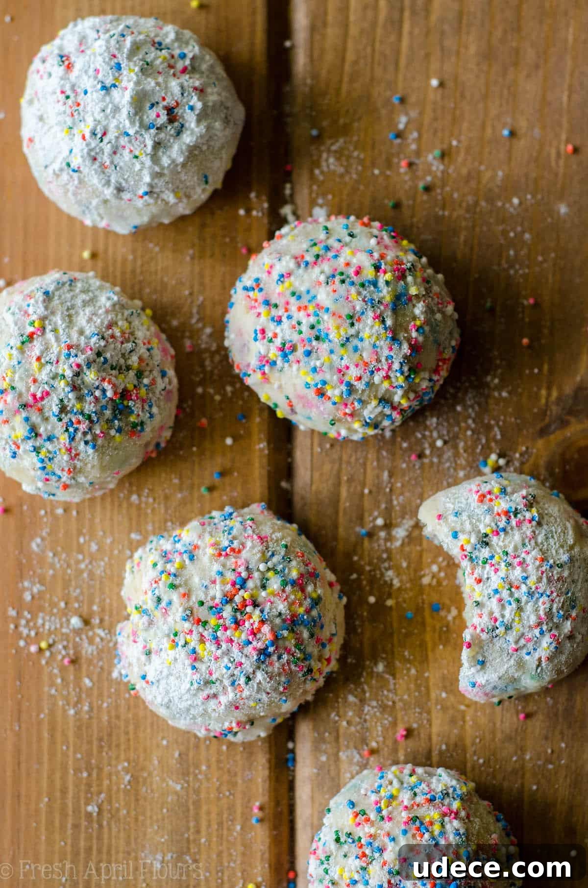 Funfetti Snowball Cookies: Colorful Cookie Bite Recipe 3 Funfetti Snowballs: Buttery, melt-in-your-mouth shortbread cookies filled with colorful sprinkles and rolled in powdered sugar.