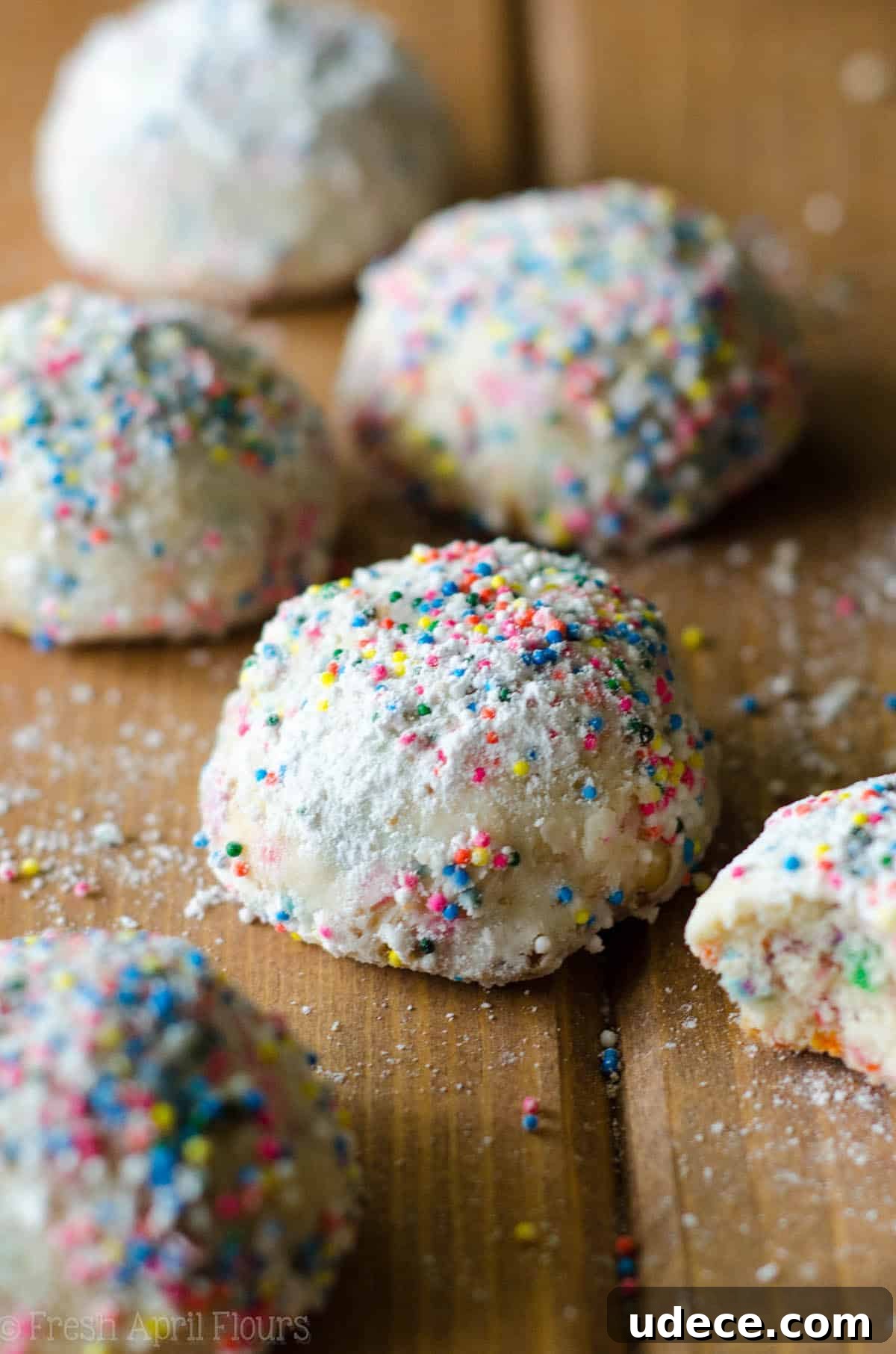 Funfetti Snowball Cookies: Colorful Cookie Bite Recipe 4 Funfetti Snowballs: Buttery, melt-in-your-mouth shortbread cookies filled with colorful sprinkles and rolled in powdered sugar.