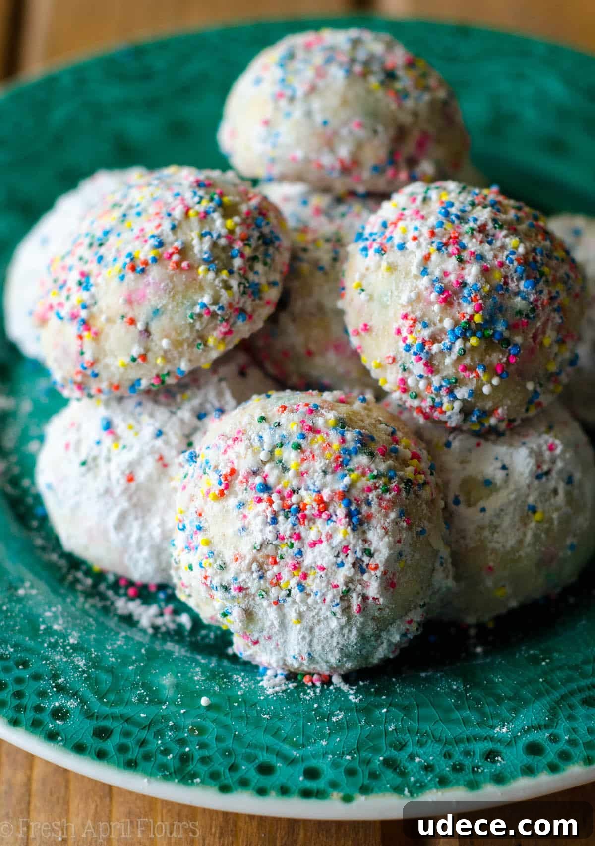 Funfetti Snowball Cookies: Colorful Cookie Bite Recipe 6 Funfetti Snowballs: Buttery, melt-in-your-mouth shortbread cookies filled with colorful sprinkles and rolled in powdered sugar.