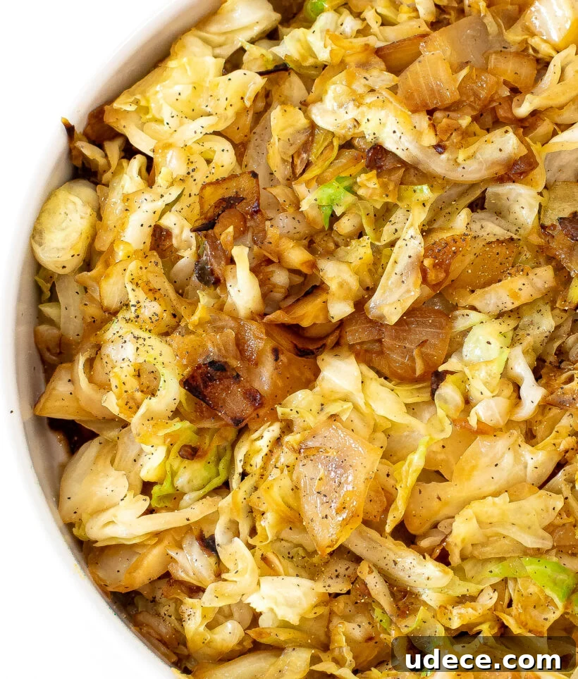 Garlic Butter Sautéed Cabbage Recipe for Quick Weeknight Sides 8 Sauteed cabbage served in a white bowl.