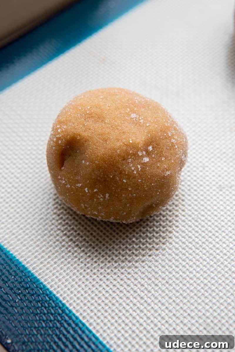 Peanut butter cookie dough on baking sheet