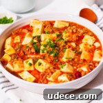 Authentic Mapo Tofu Recipe: Spicy Sichuan Classic 13 Mild spicy mapo tofu topped with green onions.