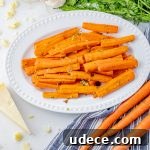 cooked carrots on a white serving platter