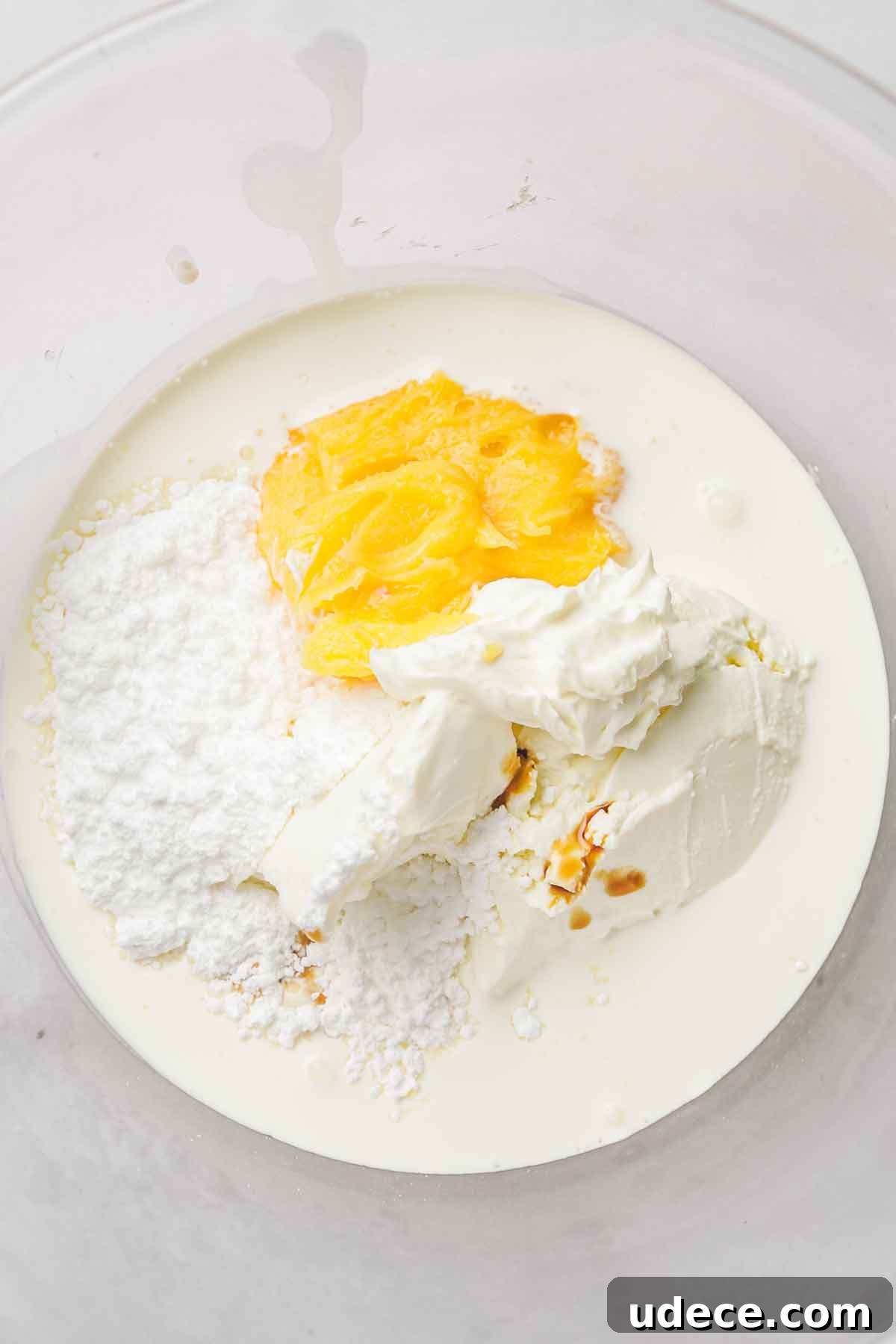 Tangy Lemon Cream Cheese Frosting Recipe for Cakes & Cupcakes 4 mixing bowl with lemon cream cheese frosting ingredients