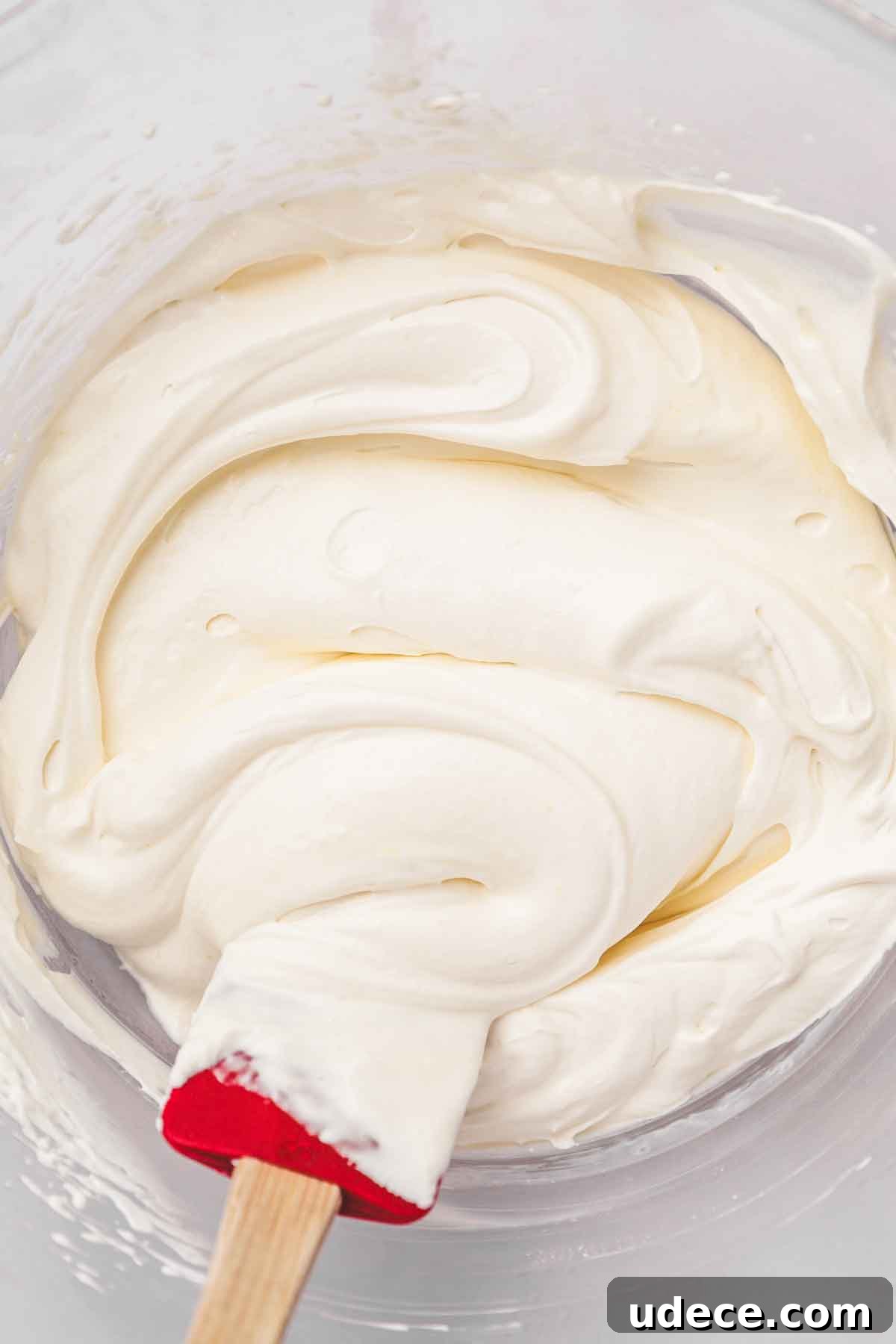 Tangy Lemon Cream Cheese Frosting Recipe for Cakes & Cupcakes 5 mixing bowl with whipped lemon cream cheese frosting