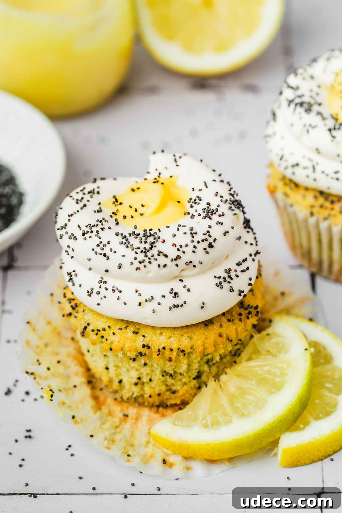 Tangy Lemon Cream Cheese Frosting Recipe for Cakes & Cupcakes 7 lemon poppy seed cupcakes with lemon cream cheese frosting