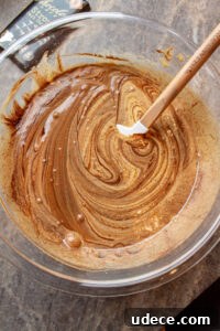 Chewy Pumpkin Brownies with Spiced Cream Cheese Swirl 7 folding chocolate into batter