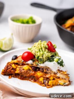 slice of enchilada pie on a white plate
