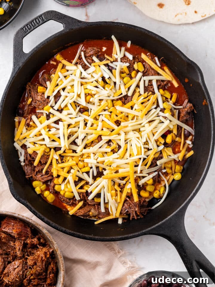 Cheesy Beef Enchilada Pie Recipe for Dinner Crowd-Pleasers 9 grated cheese added to pie