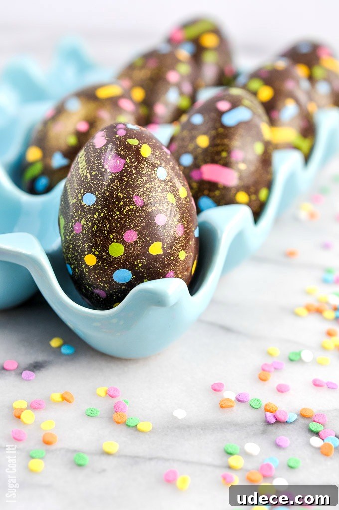 These Salted Caramel Cream Easter Eggs are a twist on the popular Cadbury eggs, featuring a decorated dark chocolate shell and a fondant salted-caramel centre.