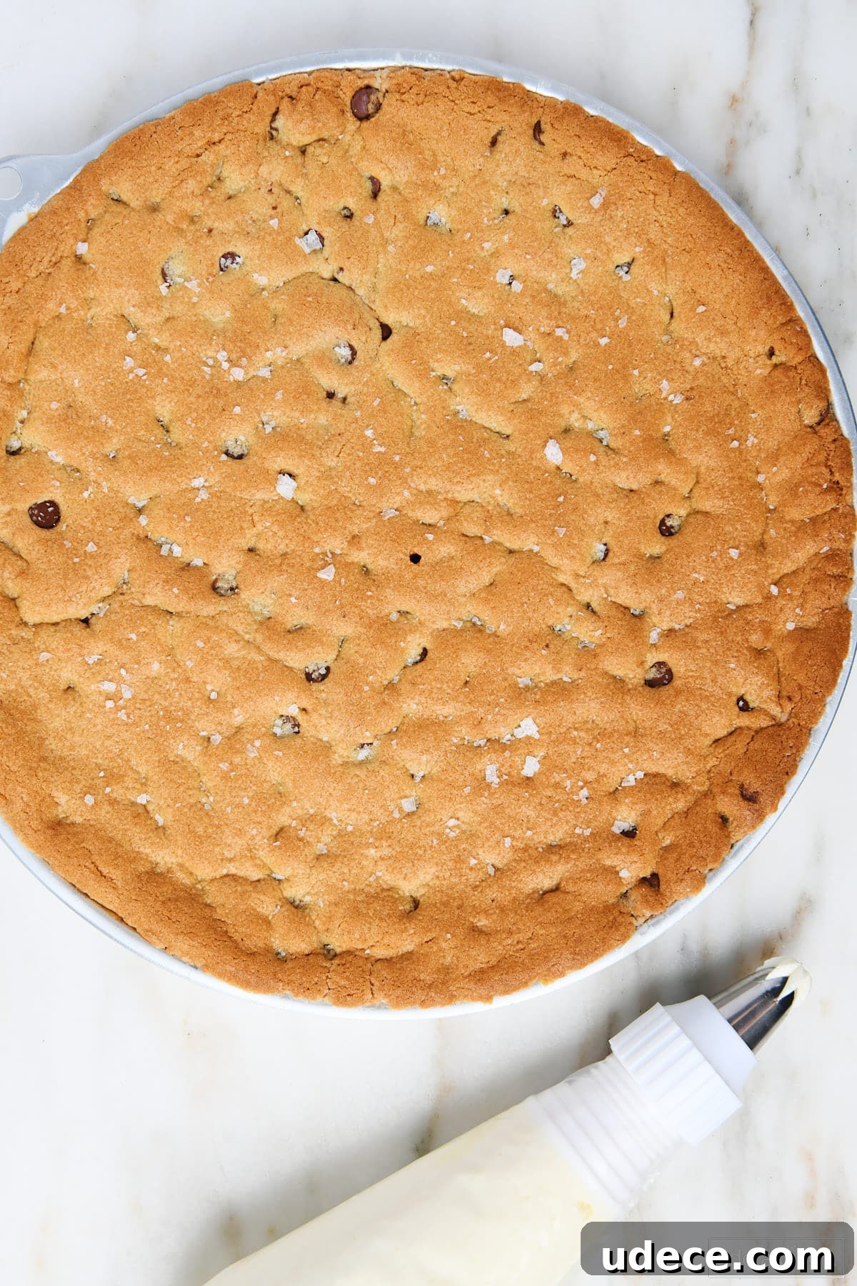 Baked cookie cake cooling ready for decorating.