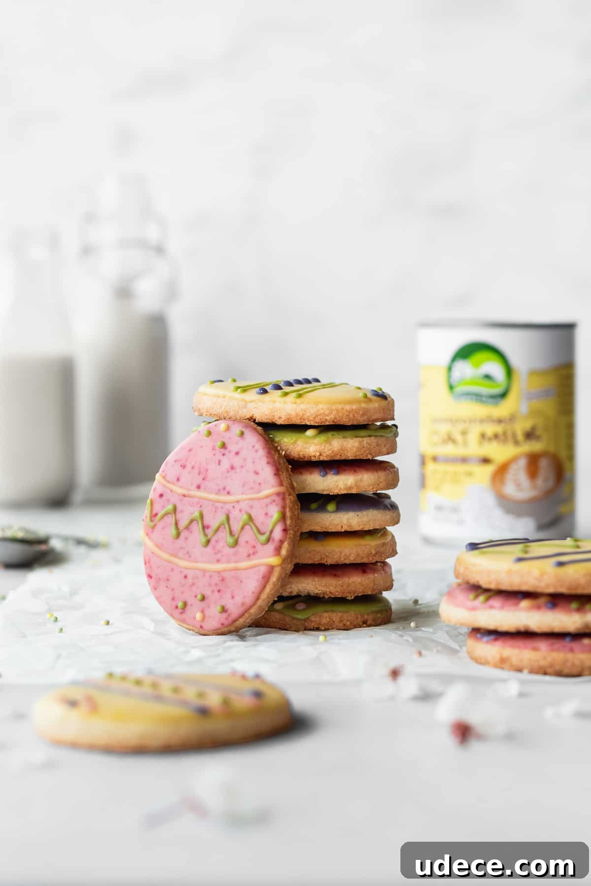 A stack of Easter cookies decorated with colorful icing.