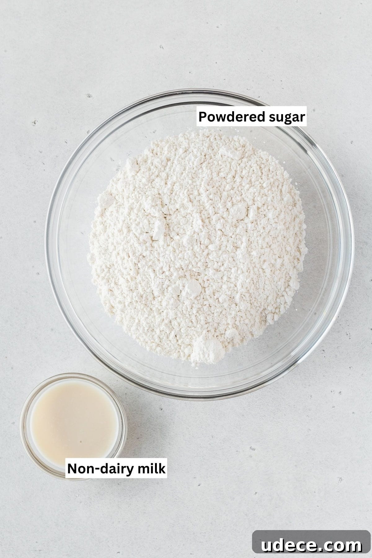 Vegan cookie glaze ingredients in bowls.