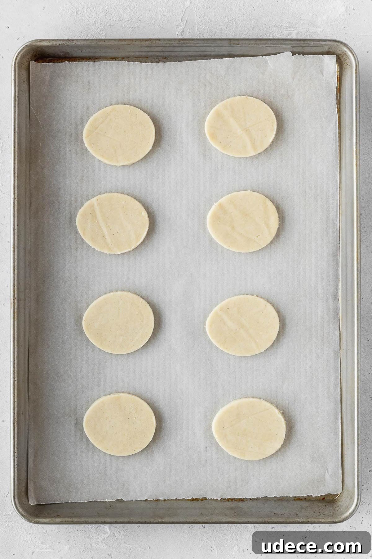 Easter sugar cookie dough on a baking sheet.