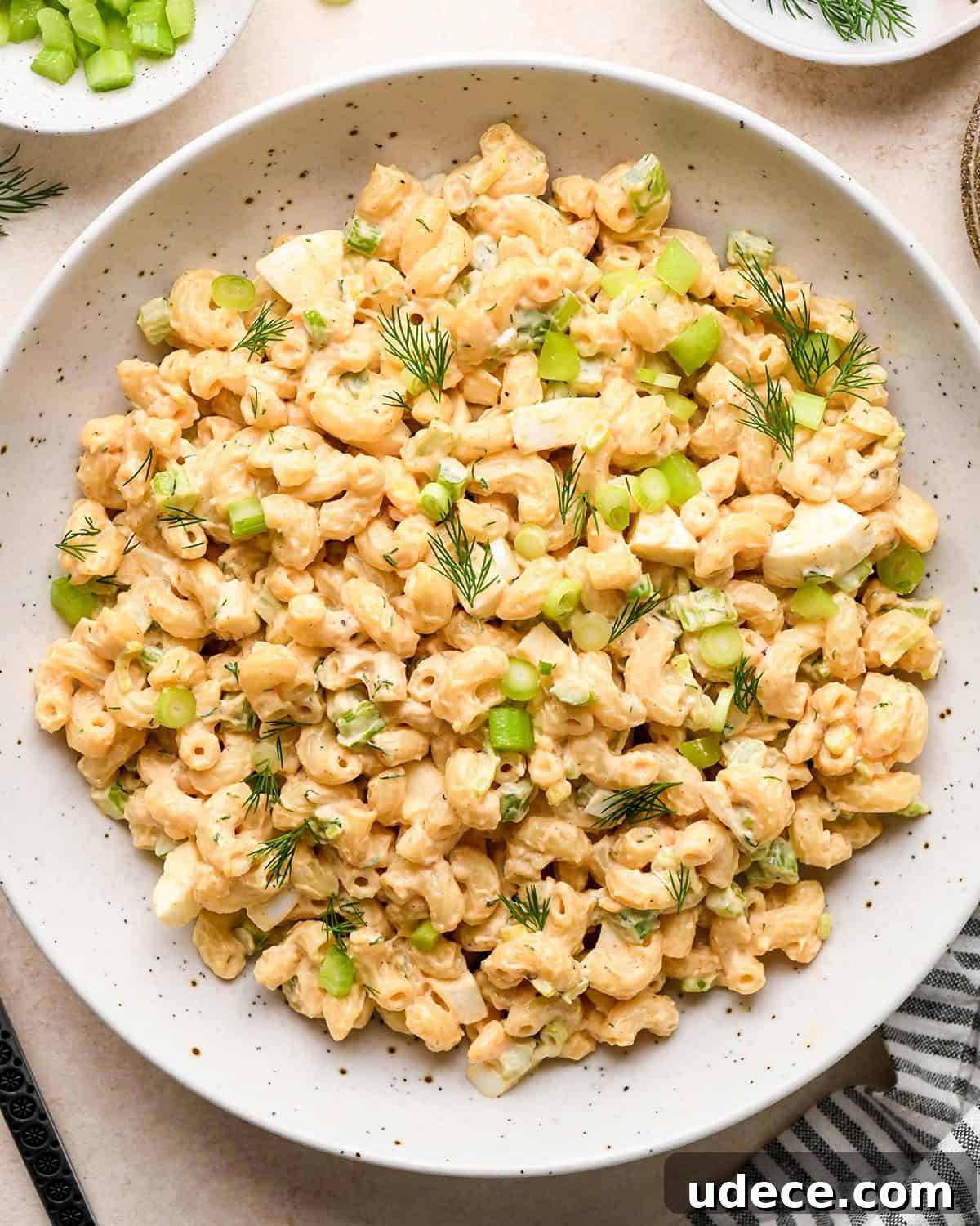 Classic Creamy Macaroni Salad Recipe 9 Macaroni Salad in a bowl garnished with dill