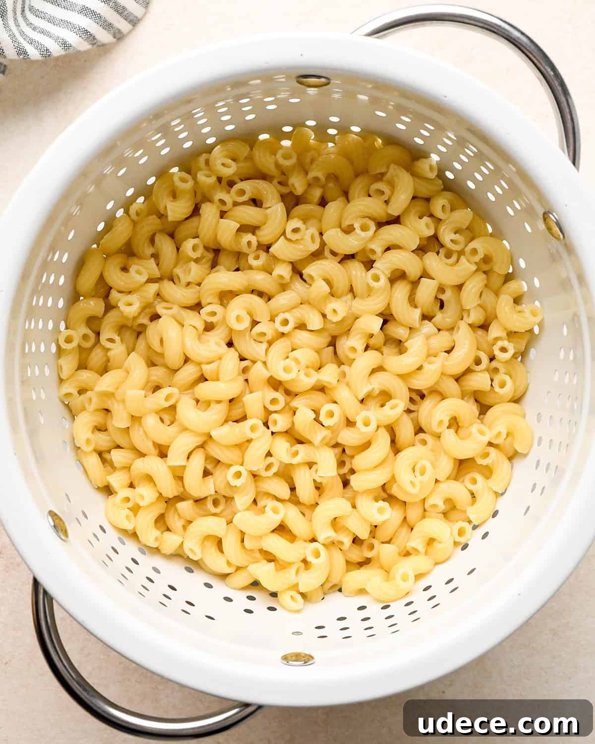 Classic Creamy Macaroni Salad Recipe 7 cooked macaroni noodles in a colander