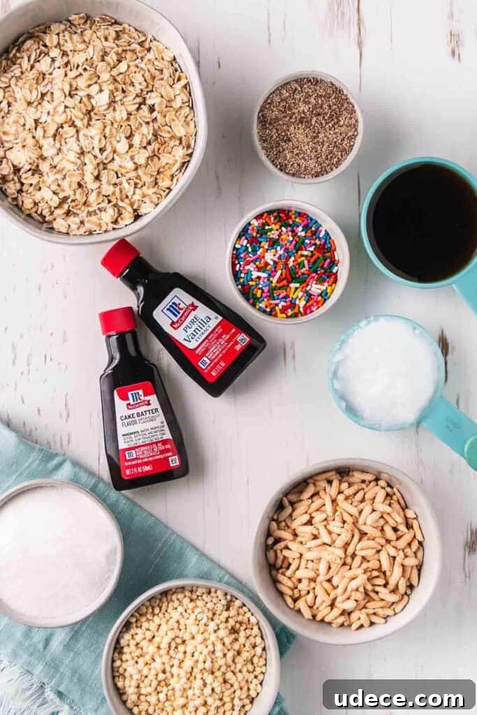 Birthday Cake Granola Recipe — Gluten-Free Celebration Crunch 3 The granola ingredients are measured out in bowls.