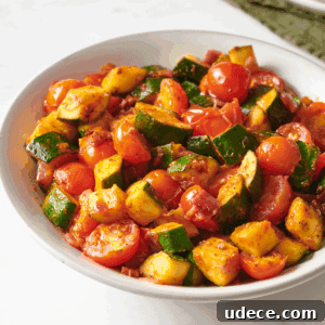 30+ Vegetarian Dinner Ideas That Make You Forget Meat Forever 5 A bowl of sautéed zucchini and tomatoes.