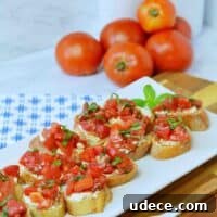 Creamy Feta and Tomato Bruschetta Recipe for Any Occasion 8 bruschetta with creamy feta on crostini