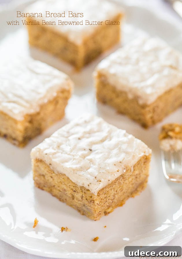Banana Bread Bars with Vanilla Bean Browned Butter Glaze on a platter. 
