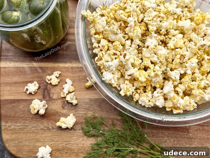 How to make the best dill pickle popcorn with just 7 ingredients. The perfect snack recipe that everyone will love.