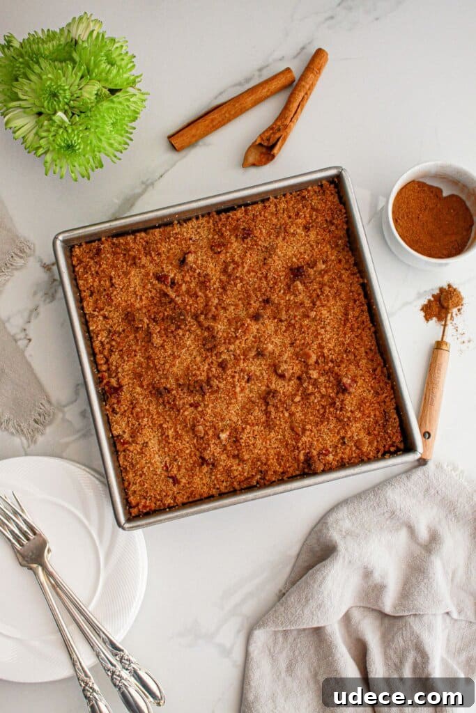 Pumpkin pie crisp in a baking dish ready to cut.