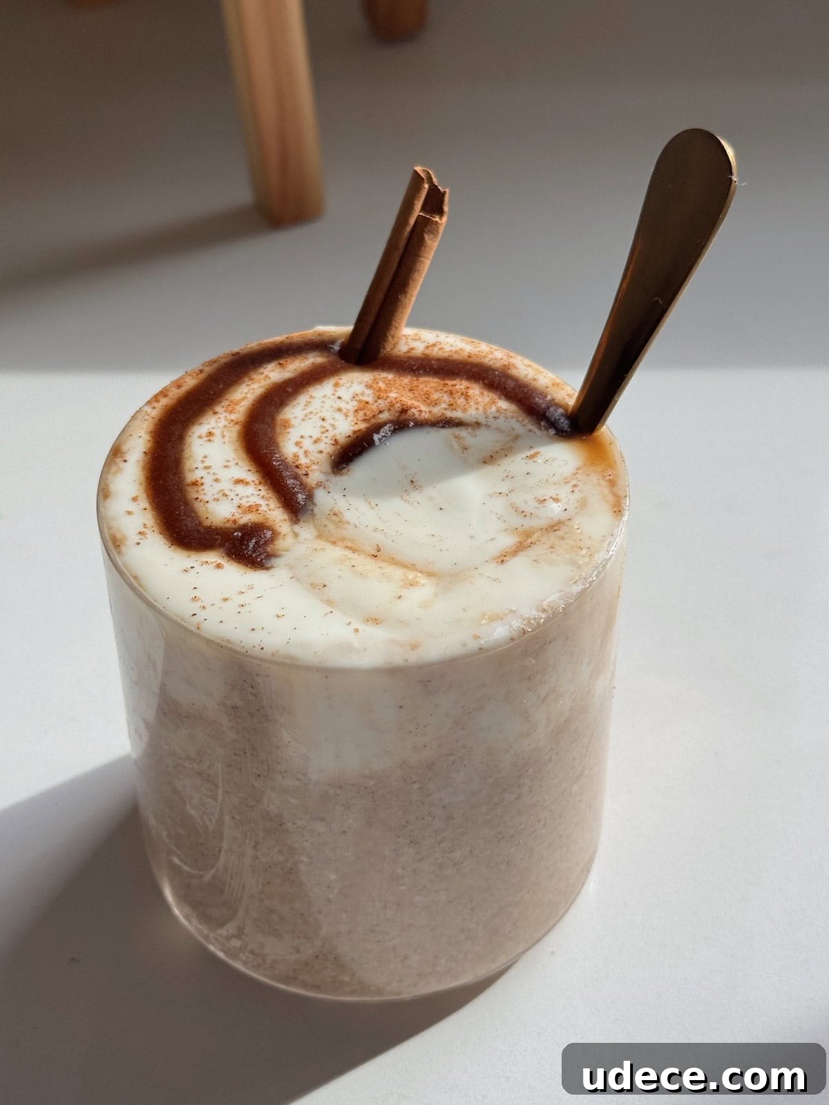 Cinnamon roll overnight oats mixed together.