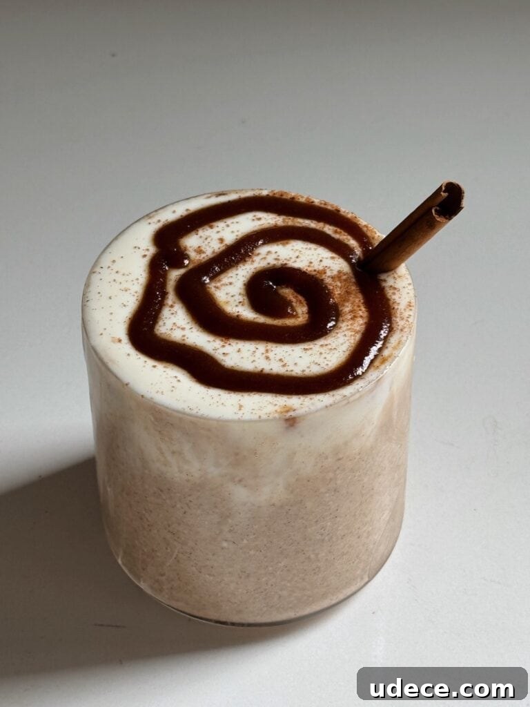 Cinnamon roll overnight oats in a cup.