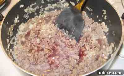Spaghetti with Authentic Greek Meat Sauce (Makaronia me Kima) 6 Simmering the beef in wine for greek recipe makaronia me kima, greek spaghetti with meat sauce.