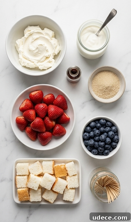 Red, White & Blue Fruit Skewers with Cheesecake Yogurt Dip Recipe 2 Red, white, and blue skewers on a platter