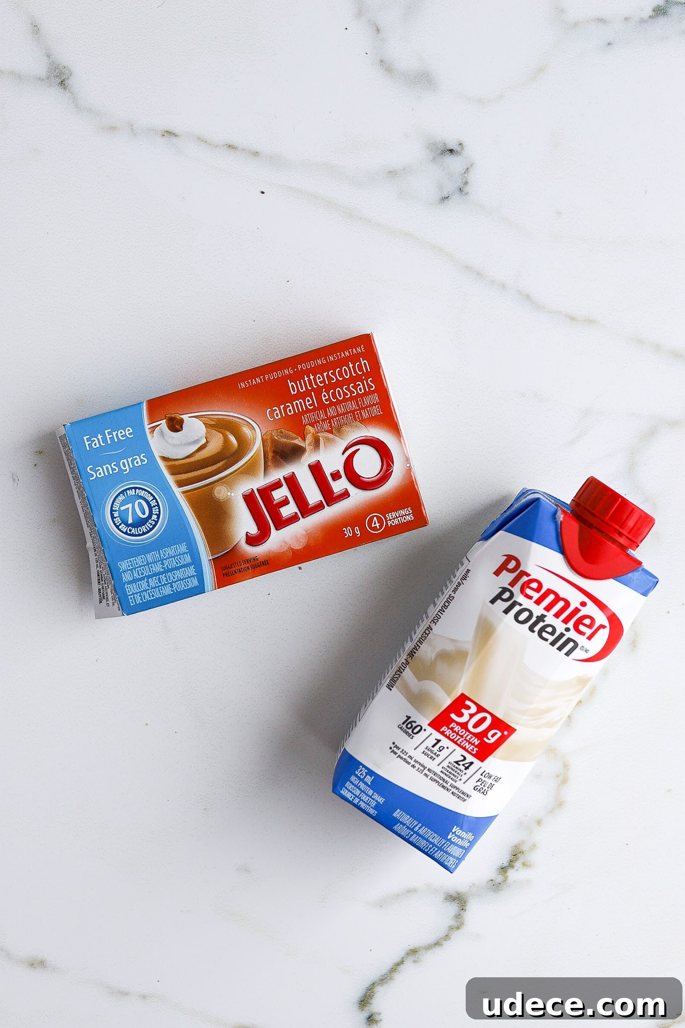 2-Ingredient Protein Pudding Without Greek Yogurt: Creamy Chocolate Recipe 4 top down shot of regular instant pudding and vanilla premier protein shake