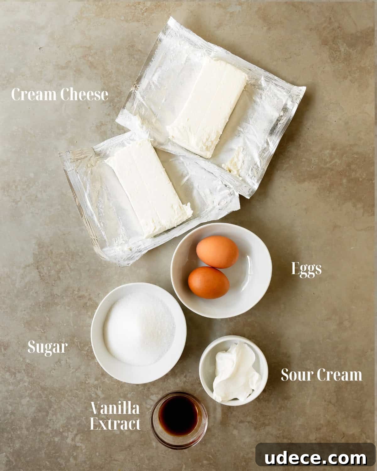 Cheesecake Layer Gather cream cheese, sugar, eggs and vanilla extract.