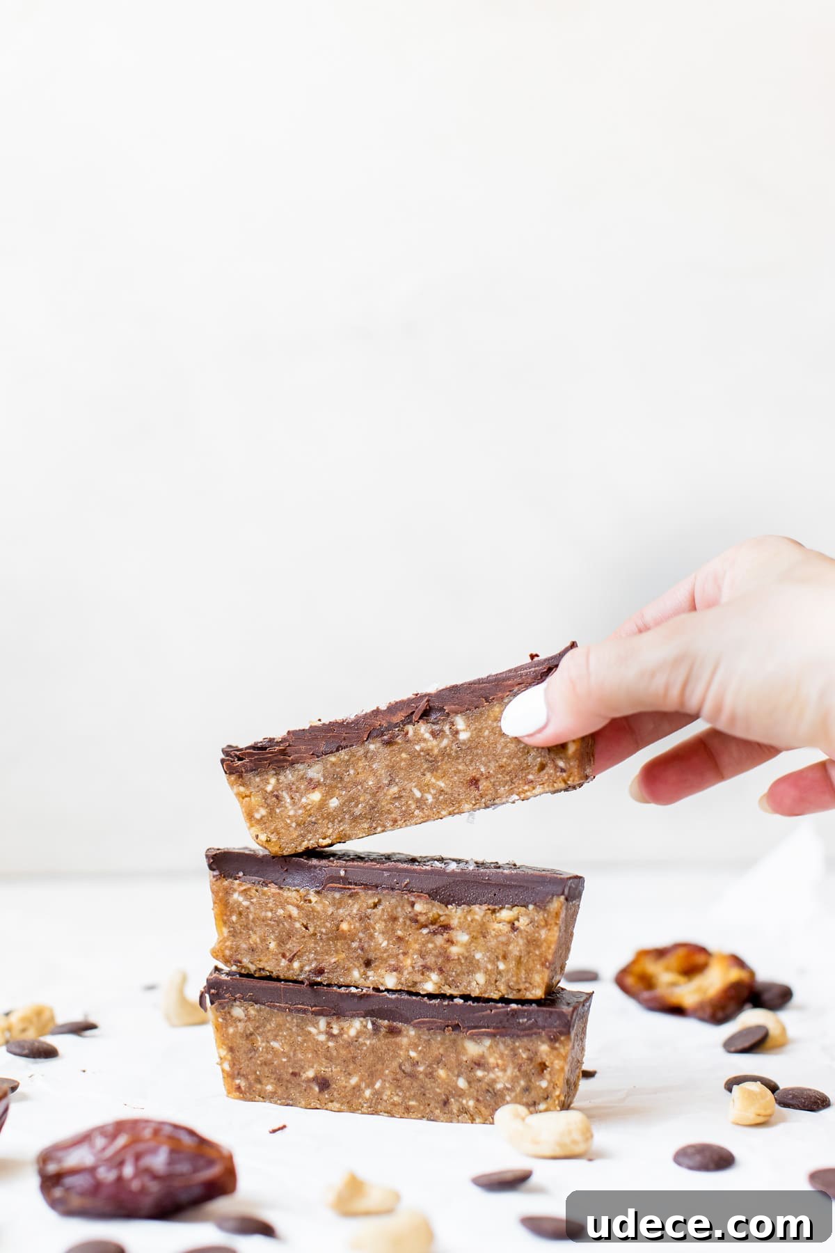 a stack of protein bars on parchment paper