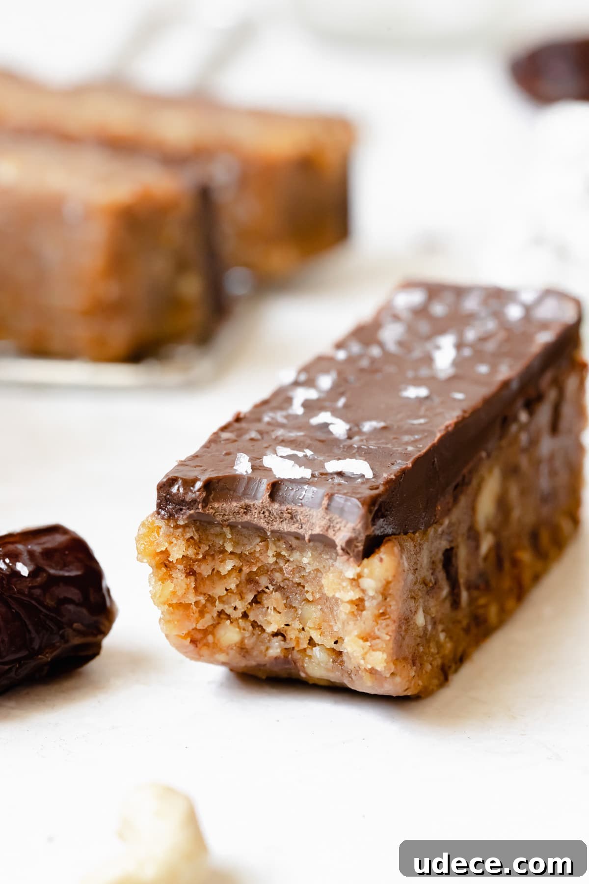 a photo of a bite taken out of a protein bar