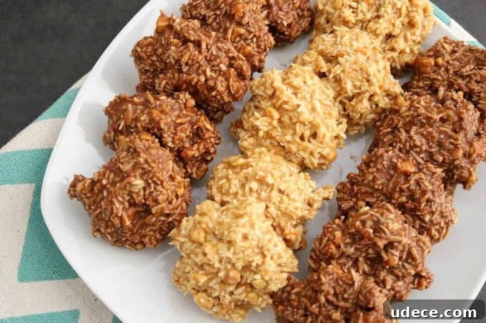 keto coconut cookies in a row on a white plate.