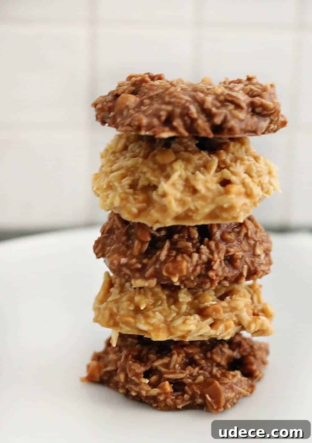 a stack of chocolate and peanut butter keto cookies.